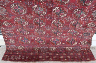 Old Tekke rug (256 cm. x 172 cm.)
In overall good condition for its age, ends secured, a repair in a corner, selvedges not original.
Shipping worldwide at cost      