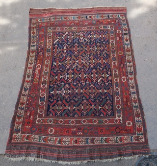 Old and small Afshar rug (186cm x 133cm / 6,10ft / 4,36ft)
Colors are all good, varied and attractive. 

Condition overall good for its age with the presence of large kilim skirts on  ...