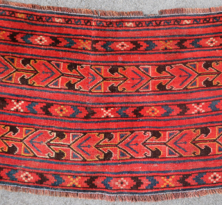 Old Ersari piece of a rare type ( 130 cm. x 50 cm.). Unusual and traditional design. Reduced and secured on all sides, a cut has been resewn (visible on the last  ...