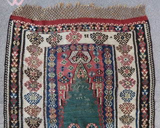 Rare and antique North East anatolian prayer kilim (175 cm. x 130 cm. with braided ends 160 cm. x 130 cm.  without)
Complete, but with several old repairs, slits and minor losses,  ...