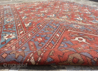 Caucasian rug (178cmX122cm). Low pile with overall uneven wear, few little repairs, frayed at ends (bottom end secured), all is shown and visible on pictures. Price fixed according to condition.   