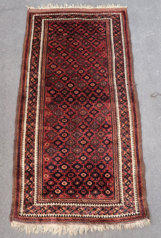 Fine and old beautiful red ground baluch rug (193 cm. x 102 cm.)
This rug is in very good condition, with beautiful saturated colors including much purple. 
Fine weave, beautiful wool and dyes.  ...