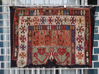 Fabulous, old, big and rare colorful Inlice (Konya area) tulip kilim fragment (137 cm. x 102 cm.) Mounted on a black fabric, clean and ready to display. Shipping worldwide at cost. If  ...