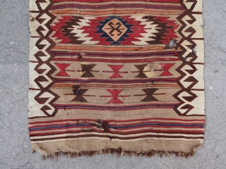 Unique and iconic, old and small Mut kilim (125 cm x 85 cm) (49,2 in x 33,45 in) This piece ticks a lot of boxes on the list of early kilims features,  ...