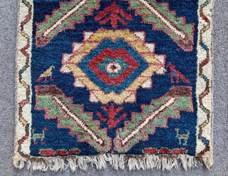 Rare, old and colorful, antique persian kurdish rug mat (58 cm. x 48 cm.)
High pile all over, Mina Khani design, rustical, with glowing abrashed colors.
Condition visible on pictures: damaged at ends, roughly ...