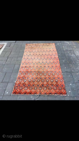 Chinese rug, it was produced in Suiyuan area. Red colour with full small flowers pattern. Good age and condition. Size 120*200cm(47*78”)            