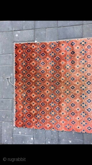 Chinese rug, it was produced in Suiyuan area. Red colour with full small flowers pattern. Good age and condition. Size 120*200cm(47*78”)            