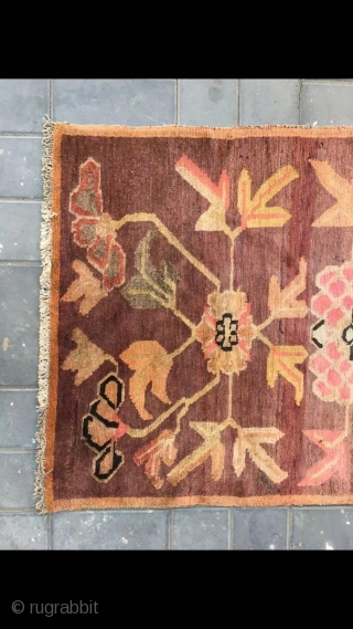 Tibetan rug, camel background with three flowers veins. Good age . Size 92*163cm(36*164”)                    