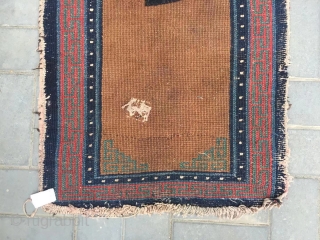 Tibetan rug, brown background with single group flower pattern, it was produced in Mid qing dynasty. Wool warp and weft. Size 75*150cm(29*58”)           