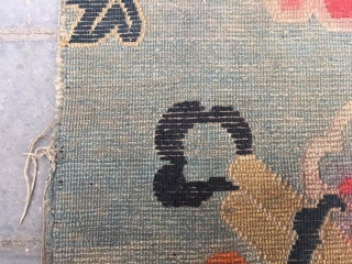 Tibetan rug, moon blue background with Chinese eight treasure veins. About mid Qing Dynasty, good age. The row knitting very tightly . Size 61*86cm( 24*34”)        