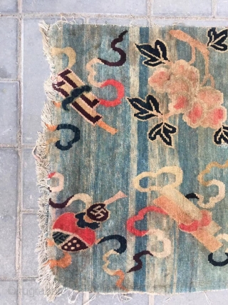 Tibetan rug, moon blue background with Chinese eight treasure veins. About mid Qing Dynasty, good age. The row knitting very tightly . Size 61*86cm( 24*34”)        