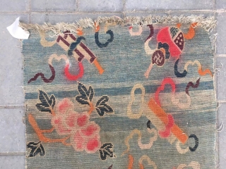 Tibetan rug, moon blue background with Chinese eight treasure veins. About mid Qing Dynasty, good age. The row knitting very tightly . Size 61*86cm( 24*34”)        