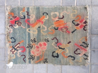 Tibetan rug, moon blue background with Chinese eight treasure veins. About mid Qing Dynasty, good age. The row knitting very tightly . Size 61*86cm( 24*34”)        