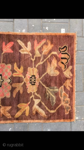 Tibetan rug, camel background with three flowers veins. Good age . Size 92*163cm(36*164”)                    