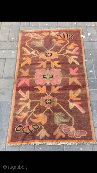 Tibetan rug, camel background with three flowers veins. Good age . Size 92*163cm(36*164”)                    