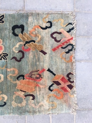 Tibetan rug, moon blue background with Chinese eight treasure veins. About mid Qing Dynasty, good age. The row knitting very tightly . Size 61*86cm( 24*34”)        