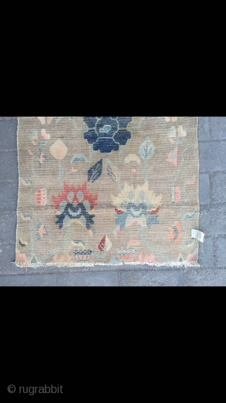 Tibetan rug, light camel background with nice peony flower pattern. Good age and condition. Size 138*88cm(54*34”)                 