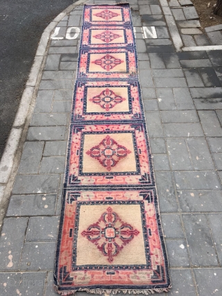 Ningxia runner carpet, six joined mats, light camel background with Buddha turns wheel veins. Very good age and condition.size 355*60cm(138*23”)             