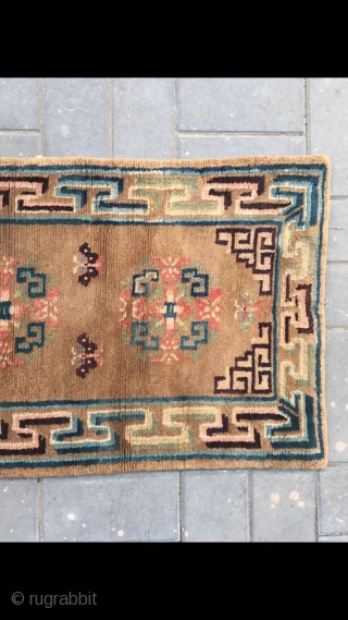 Tibetan rug, very nice camel background with three group flowers veins. Wool warp and weft . Very good and light wool quality. About late Qing Dynasty. Complete one. No any repair. Size  ...