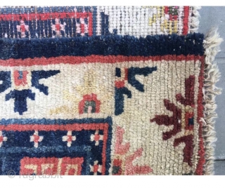 Tibetan rug, blue background with single group flower pattern. Wool warp and weft. Late Qing Dynasty. Good age and condition.63*76cm(25*30”)             