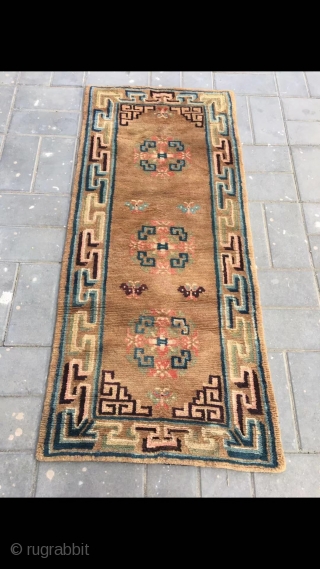 Tibetan rug, very nice camel background with three group flowers veins. Wool warp and weft . Very good and light wool quality. About late Qing Dynasty. Complete one. No any repair. Size  ...