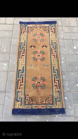 Tibetan rug, very nice camel background with three group flowers veins. Wool warp and weft . Very good and light wool quality. About late Qing Dynasty. Complete one. No any repair. Size  ...