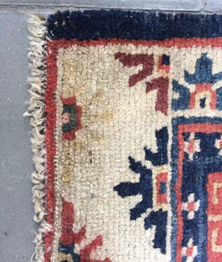 Tibetan rug, blue background with single group flower pattern. Wool warp and weft. Late Qing Dynasty. Good age and condition.63*76cm(25*30”)             