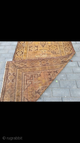 #2023 Xinjiang carpet. It was produced in Khotan area. Late 19th / circa 1900. Brown background with Xinjiang Khotan flowers pattern, some early synthetic color . Wool weft and cotton warp. Size  ...