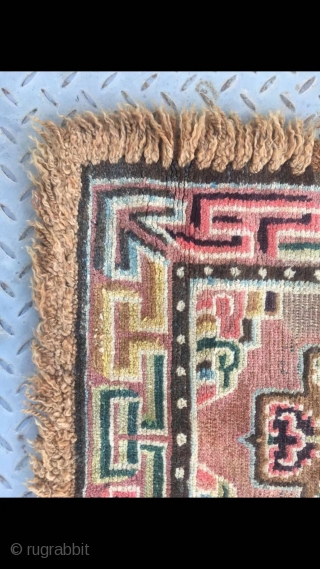 Tibetan rug, square seating rug, wool warp and weft.single cross flower with lucky cloud veins. About mid Qing Dynasty, good condition no any repair. Size 66*66cm(26*26”)       