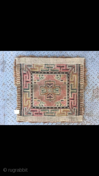 Tibetan rug, square seating rug, wool warp and weft.single cross flower with lucky cloud veins. About mid Qing Dynasty, good condition no any repair. Size 66*66cm(26*26”)       