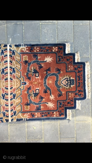 #2029 Baotou rug, it was produced in Baotou area in Inner Mongolia. A sit mat with back. Red background with lively dragon pattern, lucky cloud salvage. Good age and quality. Size 145*75cm(57*29") 