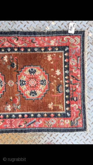 Tibetan rug, group flower pattern with Chinese Bogu veins selvage. Good age and condition. Size 138*75cm(53*29)                 