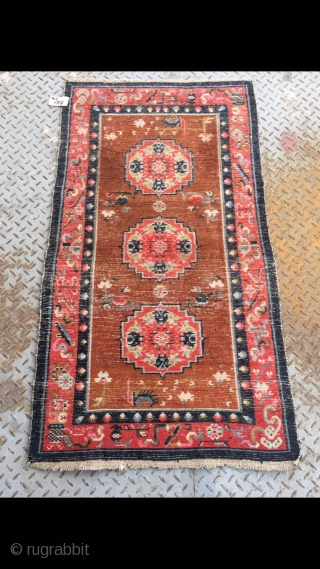 Tibetan rug, group flower pattern with Chinese Bogu veins selvage. Good age and condition. Size 138*75cm(53*29)                 