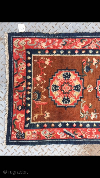 Tibetan rug, group flower pattern with Chinese Bogu veins selvage. Good age and condition. Size 138*75cm(53*29)                 