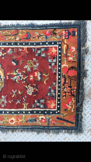 Tibetan rug, red background with colorful flower and grass pattern. Good age and condition. Size 165*88cm(64*34”)                 