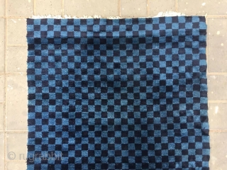 Tibetan rug, two blue square checker board veins. Good age and condition. Size 91*154cm (35*60”)                  