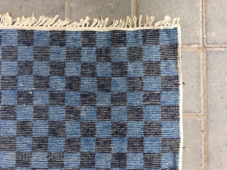 Tibetan rug, two blue square checker board veins. Good age and condition. Size 91*154cm (35*60”)                  