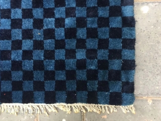 Tibetan rug, two blue square checker board veins. Good age and condition. Size 91*154cm (35*60”)                  