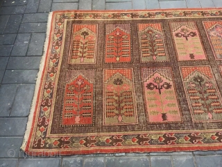 Xinjiang rug, it was produced in Khotan area Xingjiang province , very late Qing Dynasty, circa 1915. Very rare pattern . Good age and condition. Size 145*272cm(57*106”)      