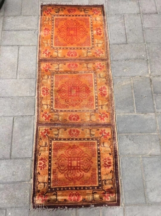 Ningxia rug, orange color with Buddha wheel veins. It was produced in early 20th century. Good age and condition. Size 60*165 cm(23*164”)           