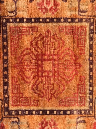 Ningxia rug, orange color with Buddha wheel veins. It was produced in early 20th century. Good age and condition. Size 60*165 cm(23*164”)           