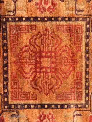 Ningxia rug, orange color with Buddha wheel veins. It was produced in early 20th century. Good age and condition. Size 60*165 cm(23*164”)           