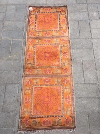 Ningxia rug, orange color with Buddha wheel veins. It was produced in early 20th century. Good age and condition. Size 60*165 cm(23*164”)           