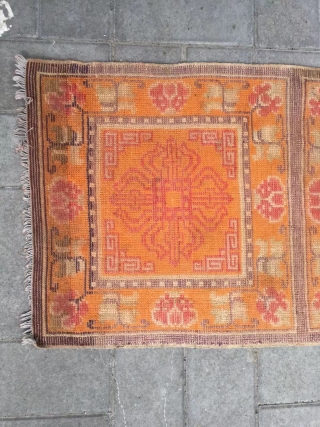 Ningxia rug, orange color with Buddha wheel veins. It was produced in early 20th century. Good age and condition. Size 60*165 cm(23*164”)           