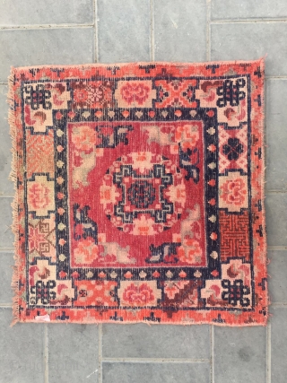 #2045 Baotou rug, lama sitting mat, red background with single group flower veins, around four bats and flower selvage. Good age and quality. Size 70*70cm(27*27")        