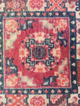 #2045 Baotou rug, lama sitting mat, red background with single group flower veins, around four bats and flower selvage. Good age and quality. Size 70*70cm(27*27")        