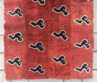 Tibetan rug. Red background with lucky cloud pattern. Good age and condition. Size 75*150cm(29*59”)


rugrabbit note: This is a fake.              