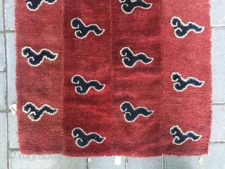 Tibetan rug. Red background with lucky cloud pattern. Good age and condition. Size 75*150cm(29*59”)


rugrabbit note: This is a fake.              