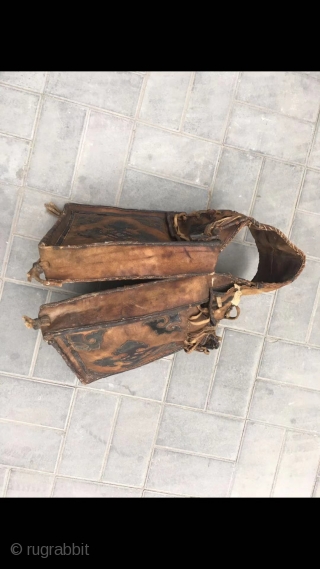 Cowhide bag, it was produced in Kazakhstan. Used for long trips on horseback. It can put in for jugs, naan, etc. In the late Qing Dynasty, the back and side pockets were  ...