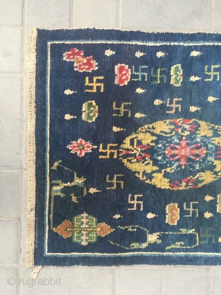 #2056 Tibet rug, blue background with colorful flower group pattern, around full of Buddha fingers , lucky cloud and flowers veins. Very good age, wool warp and weft, size 151*76cm (59*30")  